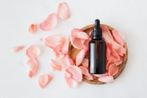 Herbal tincture bottle on flower petals representing Naturopathic Clinic in Etobicoke